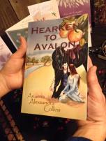 Hearken to Avalon Book Cover in hands 1