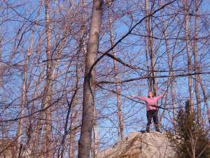 Arianna standing with the trees